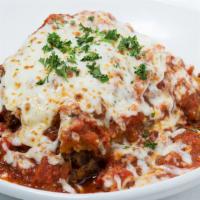 Lasagna · Ground beef, sausage, ricotta cheese, pasta sauce and mozzarella cheese.