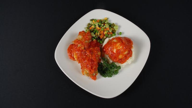 Stuffed Cabbage · Served with mashed potatoes.