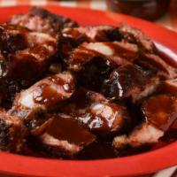 Rib Tips · A Chicago Classic, these tips are seasoned with our rib rub, slow-smoked to perfection, plac...