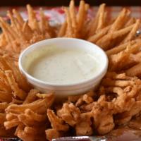 Onion Blossom · Jumbo onion double-dipped in our seasoned breading & fried to a crisp golden brown. Served w...