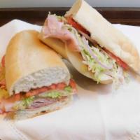 Taylor St. (Big Tony) · Huge Layers of salami, ham, hot capicola, Provolone cheese, topped with shredded lettuce, re...