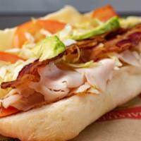 Racine Ave. (Turkey) · Lower sodium turkey breast, bacon, Provolone cheese, avocado, shredded lettuce, tomato, and ...