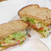 Washington St (Veggie) · Several layers of swiss cheese topped with shredded lettuce, avocado, cucumber, roasted red ...