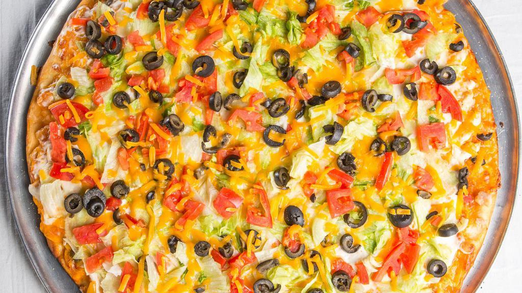 Medium Taco Pizza · Chunky salsa, ground beef or chicken and Cheddar cheese baked, then layered with sour cream, shredded lettuce, diced tomatoes and sliced black olives.
