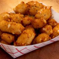Cheese Curds · Beer battered deep fried Wisconsin cheese.