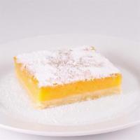 New! Lemon Bar   · A sweet and tangy lemon bar on a buttery shortbread crust.