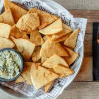 Spinach & Artichoke Dip · Served with our homemade tortilla chips.