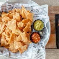 Chips & Salsa · Homemade red or green salsa served with fresh corn tortilla chips.
