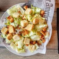 Caesar Salad · Romain lettuce, tomatoes, croutons tossed in a creamy Caesar dressing topped with grated par...