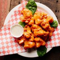 Cauliflower Wings By Kitchen 17 All Day · By Kitchen 17 All Day. Hand-breaded, fried cauliflower. Served with buffalo sauce and creamy...