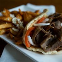Ahmo'S Gyro · Lamb, beef and chicken, onions, lettuce, tomatoes, and garlic dressing.