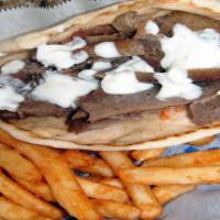 Feisty Gyro · Lamb, beef, onions, tomatoes, spicy Feta cheese and cucumber sauce.