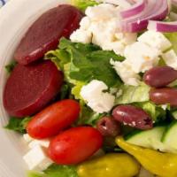Greek Salad · Lettuce, cherry tomatoes, red onions, kalamata olives, cucumbers, green peppers, beets, pepp...