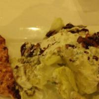 Norwegian Salmon (Supper Club) · Grilled fillet of buttery, cold water salmon finished with herb-garlic butter.

Consuming ra...