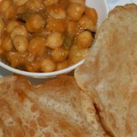 Puri (1 Piece) · Puri is a unleavened deep-fat fried bread made from wheat flour.