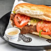 Large Steak N' Cheese · Steak, cheese, onions, lettuce, tomatoes, tubby's famous dressing.