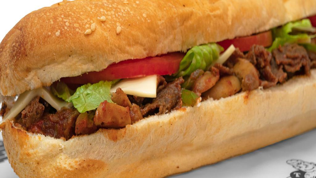 Large Loaded Steak · Steak, cheese, pizza sauce, mushrooms, green peppers, onions, lettuce, tomatoes, tubby's famous dressing.