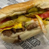 Regular All American Cheeseburger · Hamburger, American cheese, raw onions, lettuce, tomatoes, pickles, ketchup, mustard.