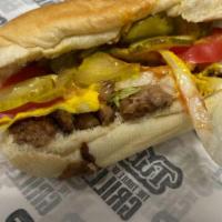 Large All American Cheeseburger · Hamburger, American cheese, raw onions, lettuce, tomatoes, pickles, ketchup, mustard.