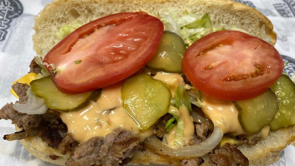 Large Big Tub · Grilled burger topped with American cheese, thousand island dressing, pickles, and all the fixings.
