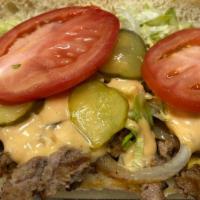 Regular Big Tub · Grilled burger topped with American cheese, thousand island dressing, pickles, and all the f...