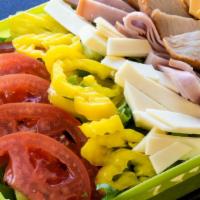 Chef Salad · Lettuce, ham, turkey, Swiss American cheese and American cheese, tomato, mild pepper rings w...