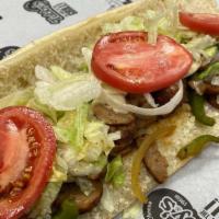 Large Italian Sausage · Italian sausage, cheese, green peppers, onions, lettuce, tomatoes, Tubby's famous dressing.