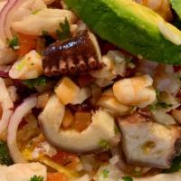 Mixta ( Seafood Combination ) · Shrimp, fish, crab, & octopus, mix with tomatoes, onion, cilantro, & lime.