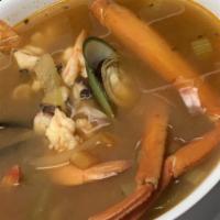 Siete Mares · Shrimp, octopus, mussel, clam, fish, & crab soup with tomato, onion, carrots, celery, & bell...
