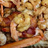 Mariscos · Platter includes shrimp sautéed in garlic sauce, spicy red chili sauce, bacon wrapped shrimp...