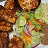 Camarones Zarandeados / Shrimp · Chargrilled and marinated in a savory sauce.
