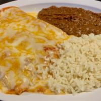 Enchilada Dinner · 3 ground beef, chicken, or cheese enchiladas.