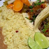 Taco Dinner ( 2 Tacos ) · Your choice of any meat or seafood, served with rice and beans.