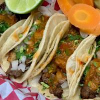 Street Taco · Your choice of meat, onion, cilantro, and salsa