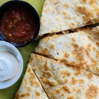 Chicken Quesadilla · Marinated grilled chicken breast or slow roasted, hand shredded beef, shredded cheese sautee...