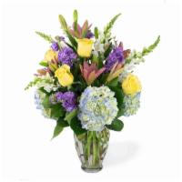 Bountiful Blooms · Go big with beautiful blooms in every color, accented by eucalyptus and curly willow tips.