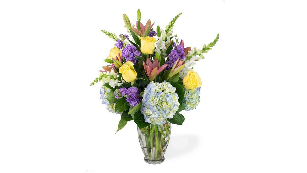 Bountiful Blooms · Go big with beautiful blooms in every color, accented by eucalyptus and curly willow tips.