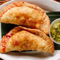 Beef Empanadas · 2 pieces. Comes with chimichurri sauce. Contains gluten, soy, and nightshades. We cannot mak...