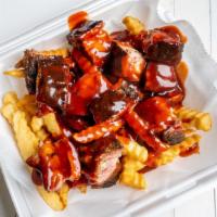 Medium Turkey Tips · Slow cooked turkey ribs tips served w/ fries, comes with our signature mild sauce or spicy B...