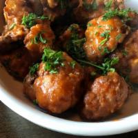 Buffalo Cauliflower · Vegetarian. Crispy hand-breaded cauliflower tossed in buffalo sauce and served with ranch dr...