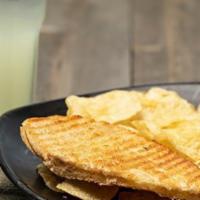 Half Grilled Cheese · Served with chips.