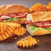 Italian Sub Meal Deal - Save Over $5! · 2 14-inch Italian Subs (Ham, Capicola, Genoa Salami & Provolone Cheese) with lettuce & tomat...