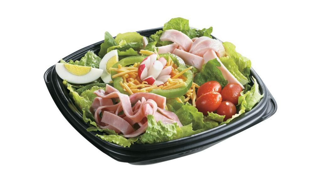 Gtg Chef Salad · Comes with grape tomatoes, hard boiled egg, cheddar cheese, carrots, ham, turkey, and croutons with ranch dressing.
