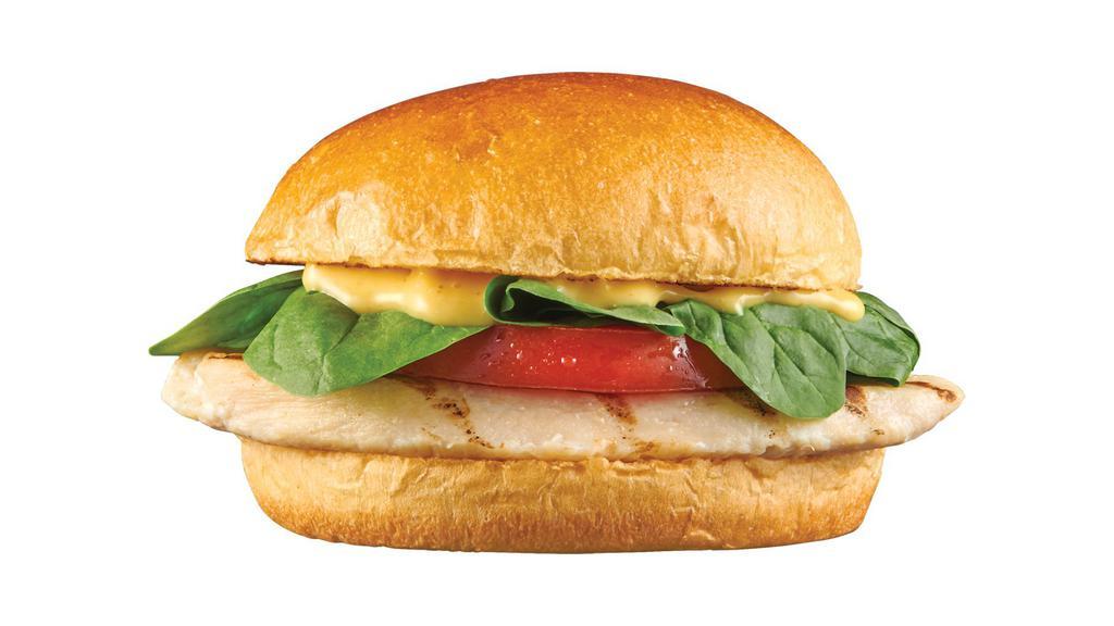 Grilled Chicken  Sandwich With Honey Mustard  · A grilled chicken filet on brioche bun with honey mustard, spinach, and tomato.