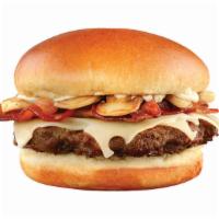 Mushroom Swiss Burger · A burger with swiss, bacon, mushrooms, and mayo on a brioche bun with choice of fries or tots.