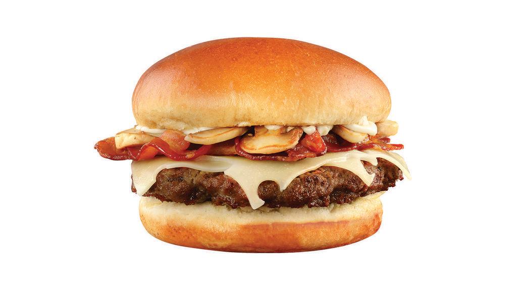 Mushroom Swiss Burger · A burger with swiss, bacon, mushrooms, and mayo on a brioche bun with choice of fries or tots.