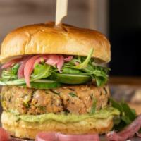 Ahi Tuna Burger · seared house-made tuna burger, avocado cream, cucumber, pickled red onion, arugula, side of ...