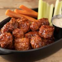 Wings · boneless wings, celery, carrots, choice of house ranch or bleu cheese, choice of flavor