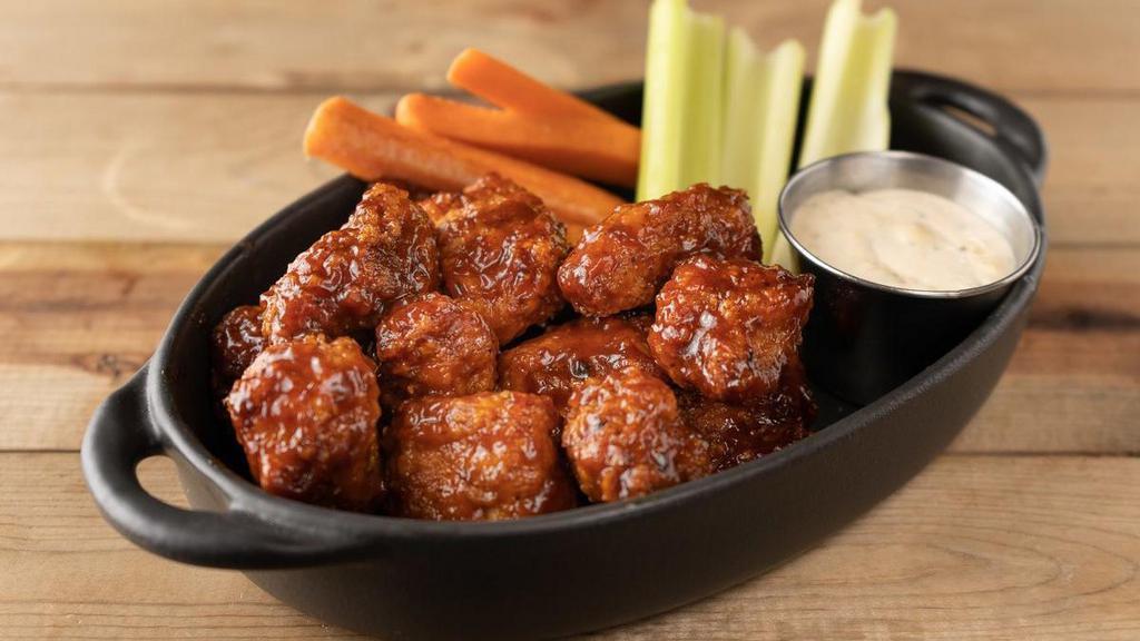 Wings · boneless wings, celery, carrots, choice of house ranch or bleu cheese, choice of flavor