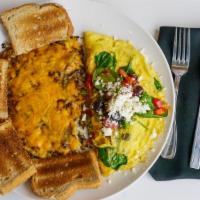 Greek Omelet · Three eggs, red peppers, green peppers, red onion tomato, spinach, kalamata olives, and feta...